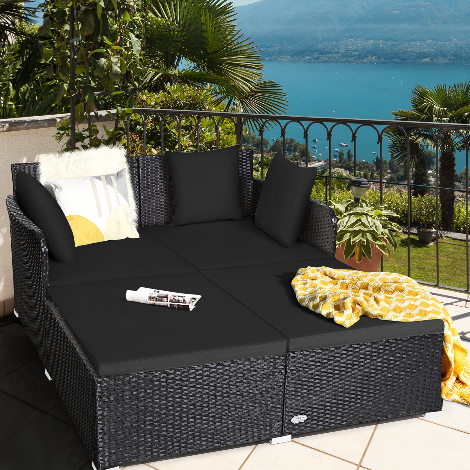 Spacious Outdoor Rattan Daybed with Upholstered Cushions and Pillows