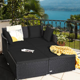 Spacious Outdoor Rattan Daybed with Upholstered Cushions and Pillows